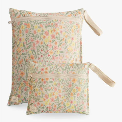 mushie Water Resistant Wet Bags | Large & Small Reusable Storage Bag for Baby Items and Travel | Zippered Pockets with Handle | Machine Washable, Set of 2 (Pastel Blooms)