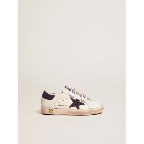 Old School Junior in white leather with blue suede star and heel tab