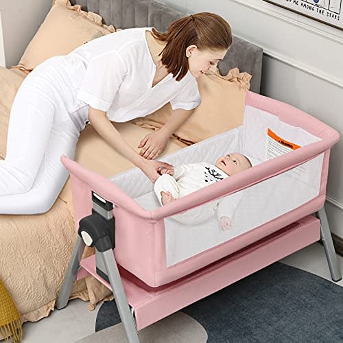 INFANS Baby Bassinet Bedside Crib, Newborn Sleeper w/Large Storage Basket, Adjustable Heights, Detachable &Washable Mattress, Breathable Mesh, Straps, Easy Moving Bed Side (Pink)
