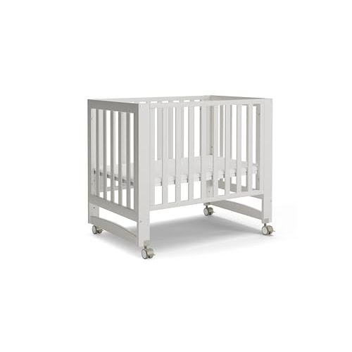 MAMAZING EvoNest 6-in-1 Convertible Baby Mini Crib with Wheels | GREENGUARD Gold Certified, New Zealand Pine Wood, 4 Adjustable Heights, Rocking Mode, Small Spaces Design, White