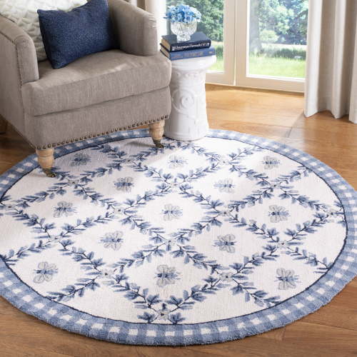 Safavieh Chelsea Lara Bordered Wool Area Rug, Ivory/Blue, 4'6" x 6'6" Oval