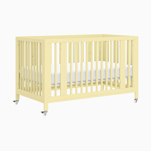babyletto Rolli 9-in-1 Convertible All-Stages Crib with Bassinet & Toddler Bed Conversion Kits - Pale Yellow