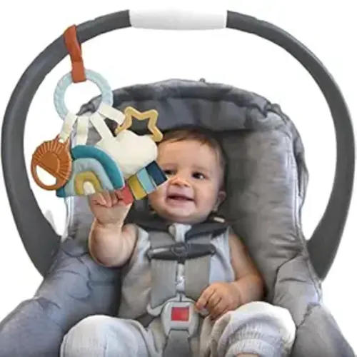 Itzy Ritzy Teething Activity Toy - Bitzy Busy Ring Infant Teething Toy Features Braided Ring & Dangling Toys, Includes Teether, Textured Ribbons, Crinkle Sound & Jingle Bell - 0 Months & Up (Rainbow)