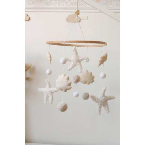 Decorative seashell mobile for baby shower gift, white and beige