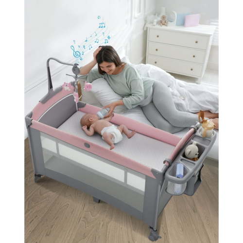 5 in 1 Baby Bassinet Bedside Crib, Easy Folding Portable Playards, Pack and Play with Mattress, Diaper Changer and Music Mobile Pink