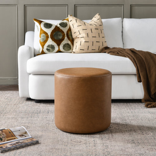 Ebern Designs 18" Wide Faux Leather Round Upholstered Ottoman & Reviews | Wayfair