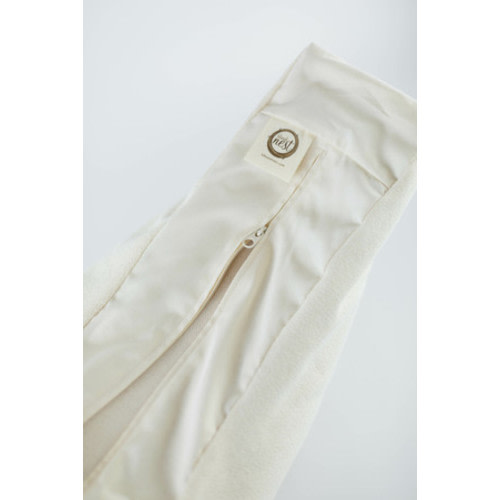 organic nesting pillow in vanilla bean