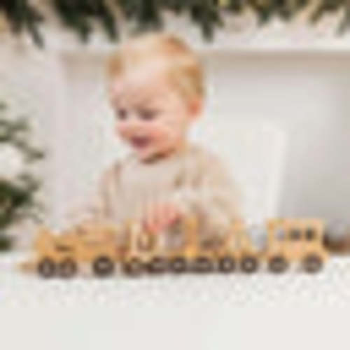 Wooden toy train spelling Clayton