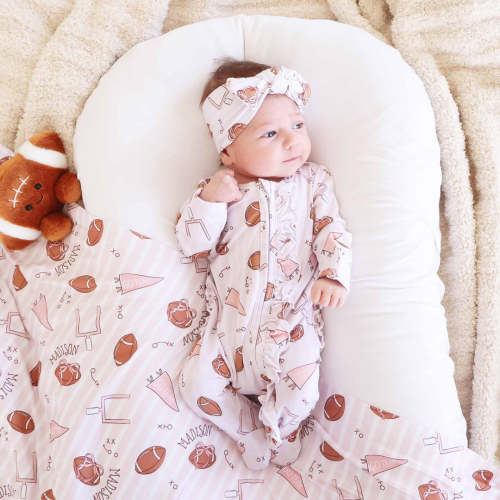 Tiny Touchdowns Ruffle Zipper Footie | Pink