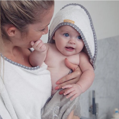 Award winning Cuddledry apron style hooded baby towel makes bathing new baby safe and easy - recommended for newborn - perfect baby gift