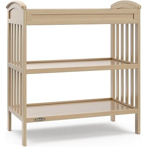 Graco Benton Changing Table with Bonus Water-Resistant Changing Pad (Driftwood) - GREENGUARD Gold Certified, Includes Diaper Change Pad with Safety Strap, 2 Open Storage Shelves for Organizing