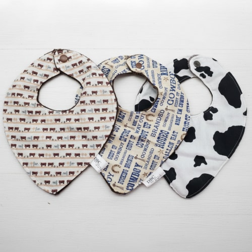 Herford Cows, Navy Cowboy, and Black Cow Print Western Bibs