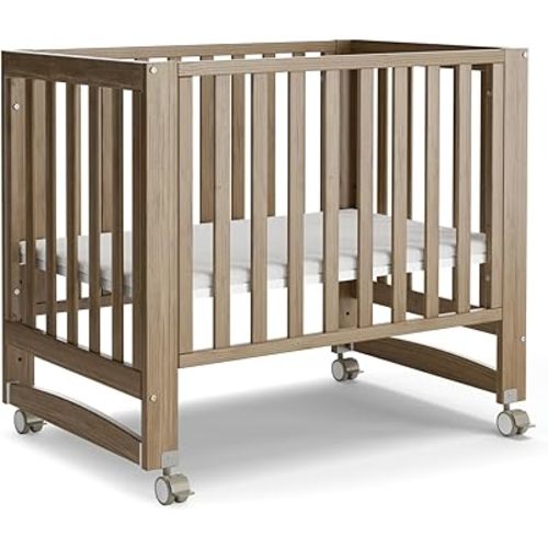 MAMAZING EvoNest Baby Crib, 6 in 1 Convertible Mini Crib with Wheels, 100% New Zealand Pinewood Growing Bed, 4 Adjustable Mattress Height,GREENGUARD Gold Certified, Teakwood