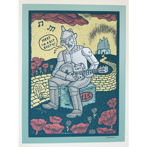 A BIT RUSTY a silkscreen print handmade by Dan Blakeslee depicting the Tinman from Oz playing a resonator guitar on the yellow brick road