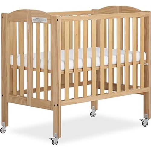 Dream On Me 2-in-1 Folding Portable Compact Mini Baby Crib in Natural, GreenGuard Gold & BSA, US Patented Flat Folding System, Locking Wheels, 1″ Mattress Pad, Space-Saving Quck Fold Easy Storage