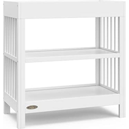 Graco Teddi Changing Table with Water-Resistant Changing Pad (White) - GREENGUARD Gold Certified, Includes Bonus Water-Resistant Changing Pad with Safety Strap, 2 Shelves, Easy-to-Match