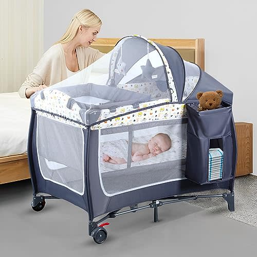 4 in 1 Pack and Play,Portable Nursery Center Baby Playard with Bassinet &Changing Table,Foldable Baby Crib Travel Playpen with Wheels,Removable Canopy with Toys,Storage Bag (Grey)