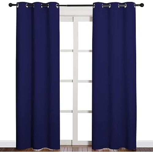NICETOWN Window Treatment Energy Saving Thermal Insulated Solid Grommet Blackout Curtains/Drapes for Living Room (Royal Blue, 1 Pair, 42 by 84-Inch)