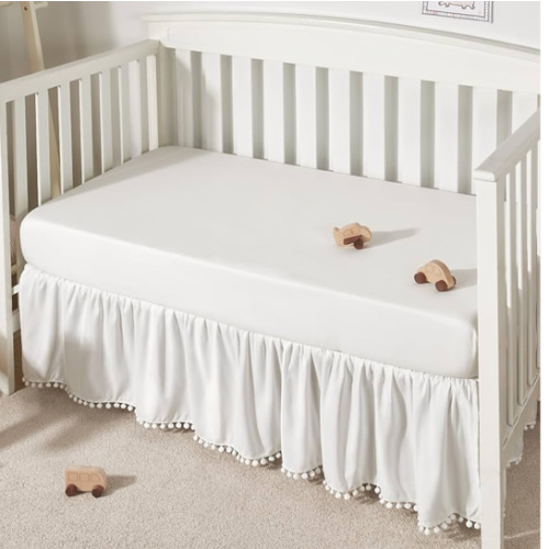 TILLYOU Baby Crib Skirt Girls Boys, Ruffled Bed Skirt with Pompoms, 28”x 52”, 14'' Drop, White