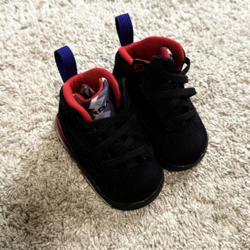 Jordan 7s baby sneakers in black with red and blue...
