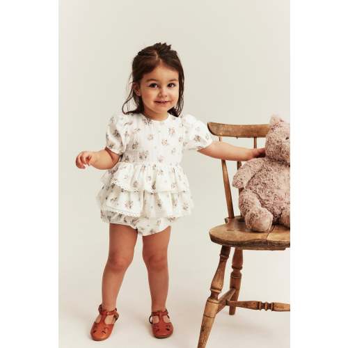 Baby floral romper with frill