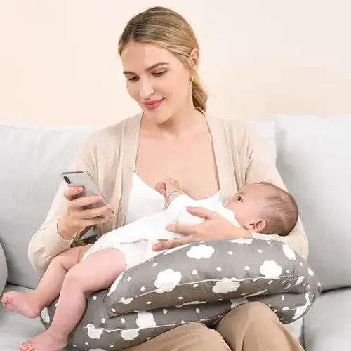 Momcozy Nursing Pillow for Breastfeeding, with Adjustable Waist - TikTok Shop