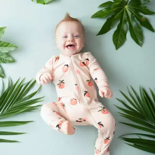 Kyte BABY Zippered Romper in Peach