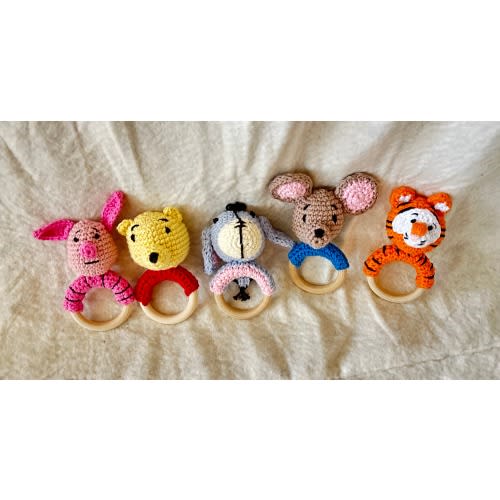 Winnie the Pooh, Eeyore, Piglet, Roo and Tigger inspired all natural rattles.