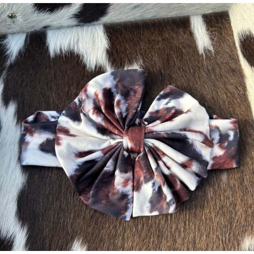Brown and white cowprint baby bow