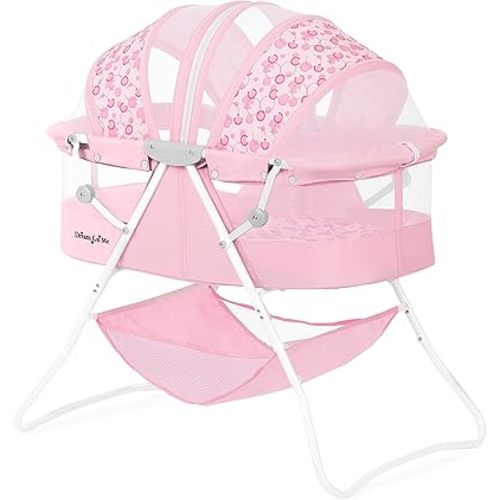 Dream On Me Karley Bassinet in Pink, Lightweight Portable Baby Bassinet, Quick Fold and Easy to Carry, Adjustable Double Canopy, Indoor and Outdoor Bassinet with Large Storage Basket.