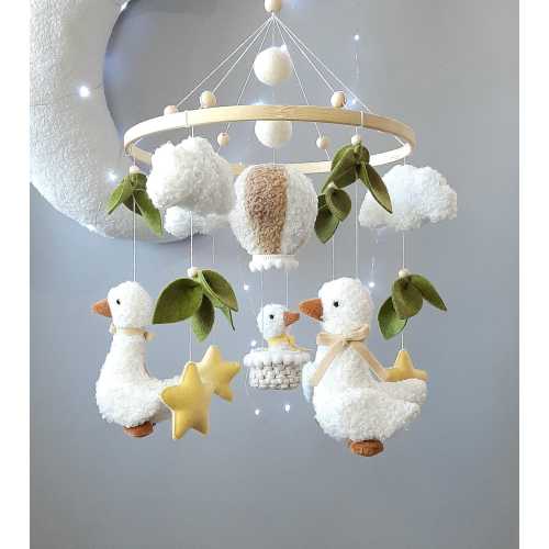 Baby mobile, mobile with a goose, mobile in a crib, toy mobile with a goose, mobile in a balloon, three geese.