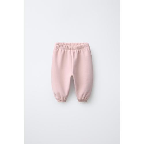 SNOOPY PEANUTS™ PLUSH JOGGER PANTS - Pink | ZARA United States