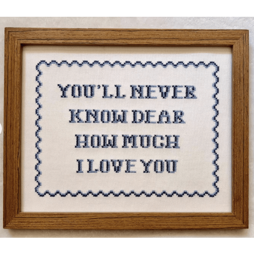 Embroidered "You’ll Never Know Dear How Much I Love You" Sign
