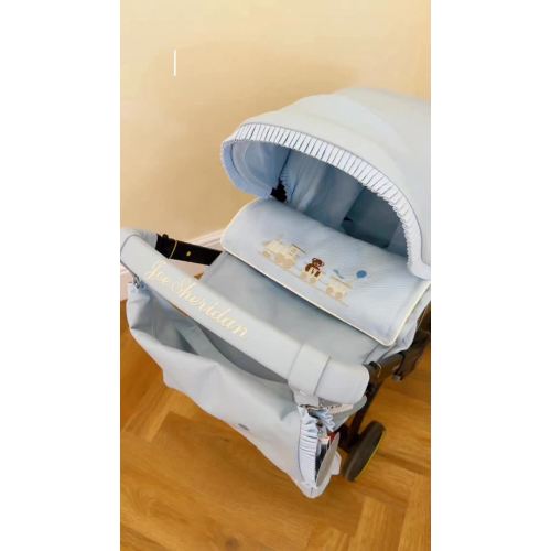 Dress your Doona X with us 🪄✨ Our beautifully personalised Doona X cover, matching bag & handle bar set in the softest baby blue with traditional train embroidery 🧸🚂 Elegant details, timeless embroidery and luxury comfort for every little journey. #doonac