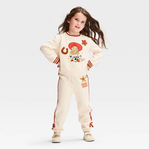 Toddler Girls' 2pc Disney Toy Story Jessie Fleece Sweatshirt and Pants Set - Cream 2T