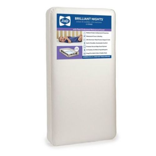 Sealy Brilliant Nights 2-Stage Dual Firmness Crib and Toddler Mattress: Hypoallergenic, Waterproof, Innerspring, Vinyl Cover