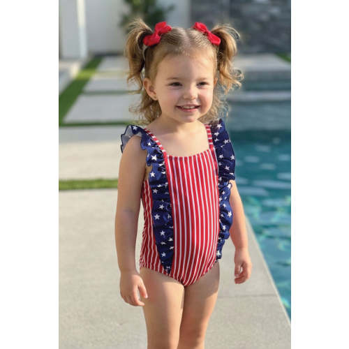 Double Ruffle Bow Back One Piece in Stars & Stripes Party | Caden Lane