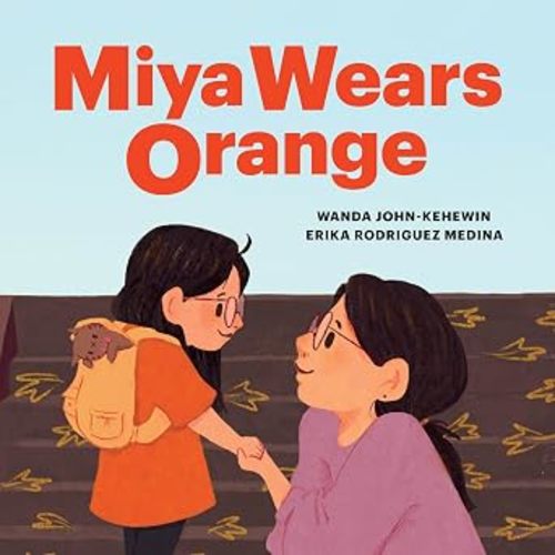 Miya Wears Orange