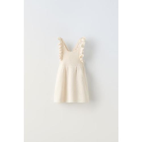 EMBROIDERED CROISSANT SHIRTRUFFLED KNIT DRESSCONTRASTING TOPSTITCHING TWILL PANTS