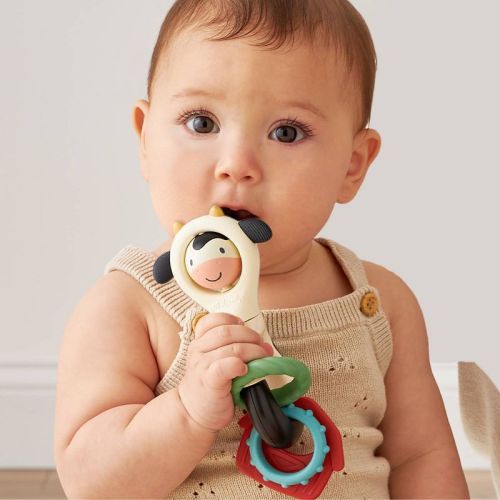 Itzy Ritzy Itzy Spinner Sensory Teething Rattle - Cow