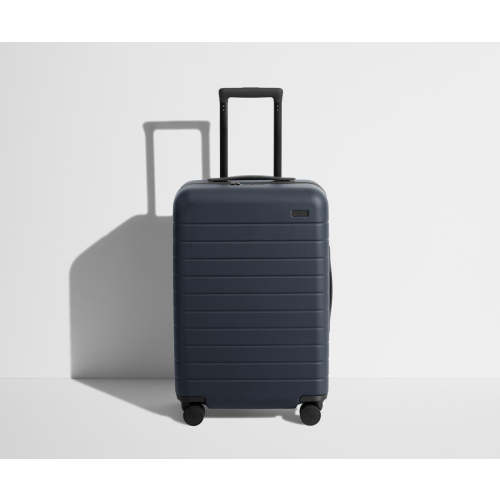 The Bigger Carry-On in Navy Blue