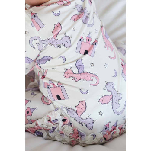 Dragon Adventure Ruffle Zipper Footie in Pink | Caden Lane