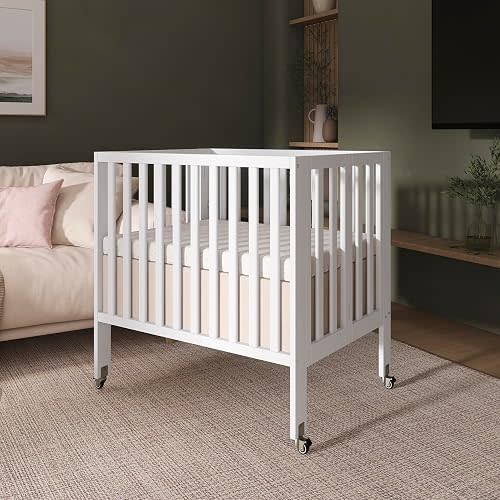 Dream On Me Mini Folding Baby Crib on wheels