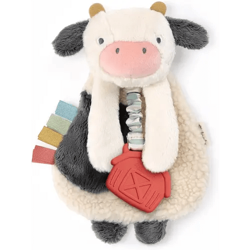 Itzy Ritzy - Itzy Lovey Including Teether - Baby Lovey with Teether, Textured Ribbons & Dangle Arms - Features Crinkle Sound, Sherpa Fabric and Minky Plush (Cow)