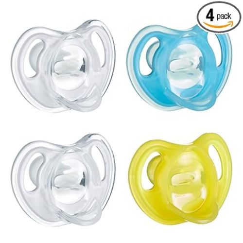 Tommee Tippee Ultra-Light Silicone Pacifier, 6-18 Months, Symmetrical One-Piece Design, BPA-Free Silicone Binkies, Clear/Blue/Yellow, Pack of 4