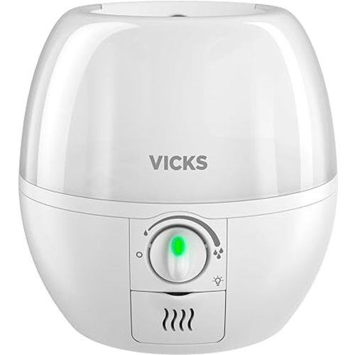 Vicks 3-in-1 SleepyTime Humidifier, No. 1 Brand Recommended by Pediatricians*. Cool Mist Humidifier with Night-Light, and Essential Oil Diffuser for Baby and Kids rooms. Visible Cool Mist, White.