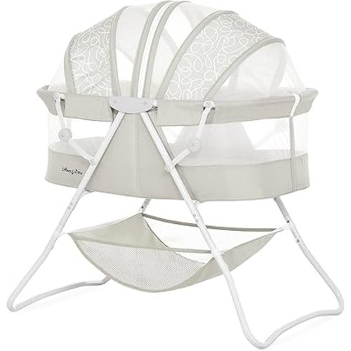 Dream On Me Karley Bassinet in Cool Grey, Lightweight Portable Baby Bassinet, Quick Fold and Easy to Carry , Adjustable Double Canopy, Indoor and Outdoor Bassinet with Large Storage Basket.