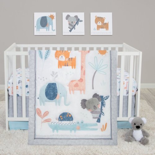 Reversible 4 - Piece Crib Bedding Set