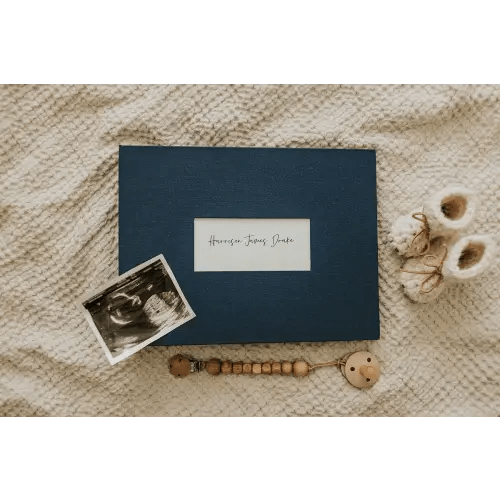 The Short Years Baby Book in Navy — The Short Years