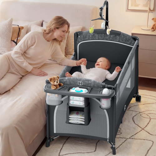 5 in 1 Baby Bassinet Bedside Crib, Easy Folding Portable Playards, Pack and Play with Mattress, Diaper Changer and Music Mobile Pink